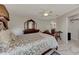 Spacious bedroom with large bed and ensuite bathroom at 570 Foxwood Blvd # 196, Englewood, FL 34223