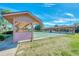 Two shuffleboard courts with covered seating at 570 Foxwood Blvd # 196, Englewood, FL 34223