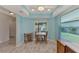 Charming breakfast nook with a table and chairs near a kitchen at 570 Foxwood Blvd # 196, Englewood, FL 34223