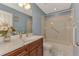 Bathroom with a tub and updated vanity with quartz countertop at 570 Foxwood Blvd # 196, Englewood, FL 34223