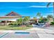 Community clubhouse with landscaping and accessible entrance at 570 Foxwood Blvd # 196, Englewood, FL 34223