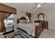 Bright bedroom with a plush bed and wood furniture at 570 Foxwood Blvd # 196, Englewood, FL 34223
