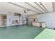 Garage with extra storage and a utility sink at 570 Foxwood Blvd # 196, Englewood, FL 34223