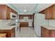 Full view of kitchen with white appliances at 570 Foxwood Blvd # 196, Englewood, FL 34223