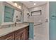 Updated bathroom with a walk-in shower and modern vanity at 570 Foxwood Blvd # 196, Englewood, FL 34223