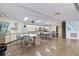 Bright community room featuring multiple tables and chairs at 570 Foxwood Blvd # 196, Englewood, FL 34223