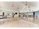 Open and airy community room with kitchen access at 570 Foxwood Blvd # 196, Englewood, FL 34223