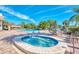 Community hot tub and lounge chairs at 570 Foxwood Blvd # 196, Englewood, FL 34223