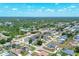 Overview of a residential neighborhood with tree-lined streets and well-kept homes at 254 Orlando Blvd, Port Charlotte, FL 33954