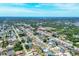 Aerial shot pinpointing a home in a residential area surrounded by tree coverage at 254 Orlando Blvd, Port Charlotte, FL 33954