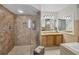 Main bathroom featuring a frameless glass shower and double vanity at 254 Orlando Blvd, Port Charlotte, FL 33954