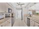 Updated kitchen featuring stainless steel appliances and granite countertops at 254 Orlando Blvd, Port Charlotte, FL 33954