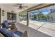 Spacious screened-in patio with comfortable seating and view of the sparkling pool at 254 Orlando Blvd, Port Charlotte, FL 33954
