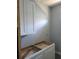 Unfinished kitchen with white cabinets at 2170 Doolittle Ln, Port Charlotte, FL 33953