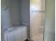 Bathroom with a walk-in shower and vanity at 2170 Doolittle Ln, Port Charlotte, FL 33953