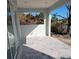 Covered back patio with paver tile floor and view of water at 2170 Doolittle Ln, Port Charlotte, FL 33953