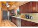 Modern kitchen with granite countertops and stainless steel appliances at 51 Palm Dr, Placida, FL 33946