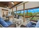 Relaxing screened porch with pool table, hammock, and scenic view at 51 Palm Dr, Placida, FL 33946
