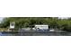 Vehicles on a ferry crossing a waterway at 51 Palm Dr, Placida, FL 33946
