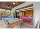 Pool table on porch with view into living room at 51 Palm Dr, Placida, FL 33946