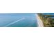Beachfront property with boat in the ocean at 51 Palm Dr, Placida, FL 33946