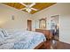 King size bedroom with wicker furniture and wood floors at 51 Palm Dr, Placida, FL 33946