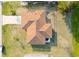 An aerial view of a single Gathering home with a brown roof at 285 Mark Twain Ln, Rotonda West, FL 33947