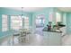 Bright kitchen with breakfast nook and view to the Gathering room at 285 Mark Twain Ln, Rotonda West, FL 33947