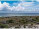 Wooden boardwalk leads to a beautiful beach at 13074 Via Flavia, Placida, FL 33946