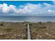 Scenic boardwalk to the beach at 13074 Via Flavia, Placida, FL 33946