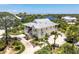 Charming home with metal roof, landscaped yard, and spacious driveway at 13074 Via Flavia, Placida, FL 33946