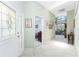 Welcoming foyer with access to the living room and a bedroom at 13074 Via Flavia, Placida, FL 33946