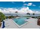 Community pool with waterfront views at Placida Beach at 13074 Via Flavia, Placida, FL 33946