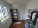 Laundry area with shelving, water heater, and window at 22481 Westchester Blvd # B35, Punta Gorda, FL 33980
