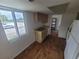 Simple kitchen with wood cabinets and laminate floors at 22481 Westchester Blvd # B35, Punta Gorda, FL 33980