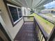 Private balcony overlooks a grassy area at 22481 Westchester Blvd # B35, Punta Gorda, FL 33980
