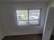 Bedroom with window and closet at 22481 Westchester Blvd # B35, Punta Gorda, FL 33980