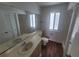 Bathroom with dual sinks, toilet and tub at 22481 Westchester Blvd # B35, Punta Gorda, FL 33980