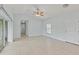 Spacious living room with tile flooring and ceiling fan at 13034 Marathon Blvd, Port Charlotte, FL 33981