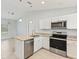 Modern kitchen with stainless steel appliances and granite countertops at 13034 Marathon Blvd, Port Charlotte, FL 33981