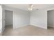 Bedroom with tile floors and access to closet at 13034 Marathon Blvd, Port Charlotte, FL 33981