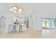 Open concept kitchen with island and breakfast bar at 13034 Marathon Blvd, Port Charlotte, FL 33981