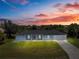 Single-Gathering home with a large yard and driveway at 13034 Marathon Blvd, Port Charlotte, FL 33981