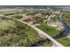 Aerial view of community near waterways and bridge at 13034 Marathon Blvd, Port Charlotte, FL 33981