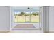 Relaxing screened patio overlooking a grassy backyard at 13034 Marathon Blvd, Port Charlotte, FL 33981