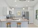 Modern kitchen with granite countertops and stainless steel appliances at 13034 Marathon Blvd, Port Charlotte, FL 33981