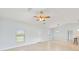 Bright and airy living room with tile floors and high ceilings at 13034 Marathon Blvd, Port Charlotte, FL 33981