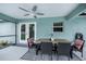Covered patio with dining table and seating at 12112 Helios Ave, Port Charlotte, FL 33981