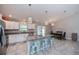 Open kitchen with granite countertops and stainless steel appliances at 12112 Helios Ave, Port Charlotte, FL 33981