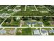 Aerial view of neighborhood with various house styles at 12112 Helios Ave, Port Charlotte, FL 33981